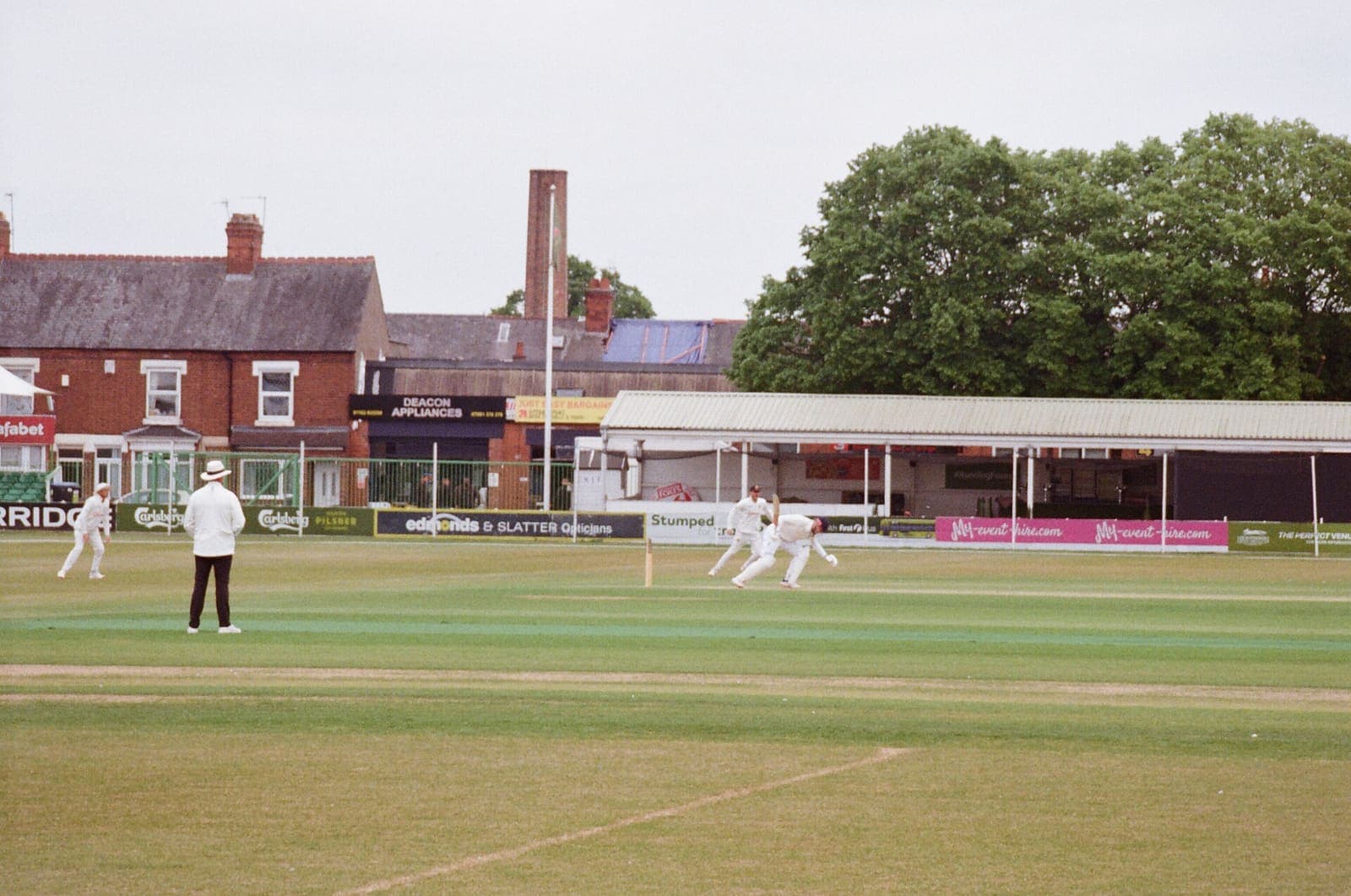 A cricket match in progress featuring Zimbabwe